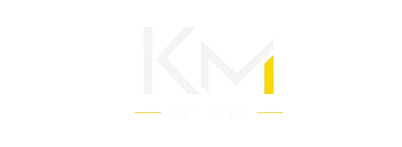 KM — Est. 1996